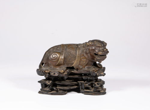 A Chinese bronze figure of a Kylin