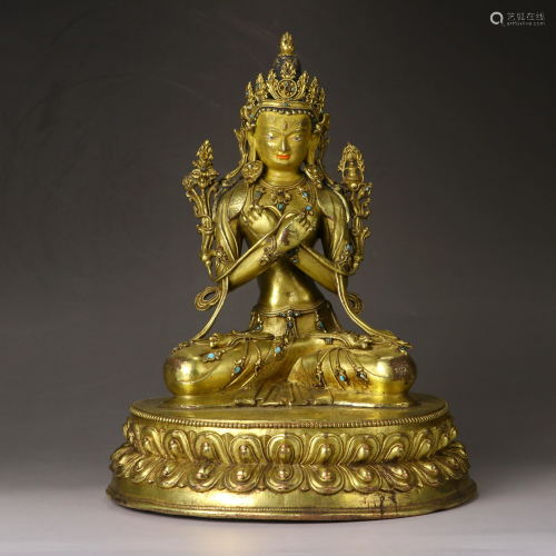 A Sino-Tbetan gilt bronze figure of Vajradhara