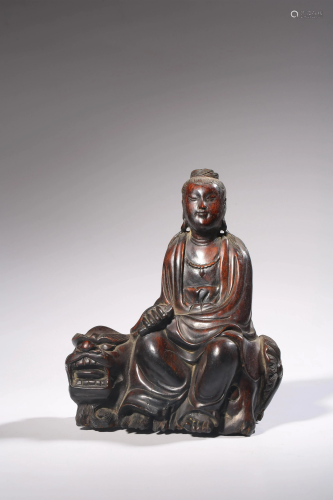 A Chinese rosewood figure of a Shihou Guanyin