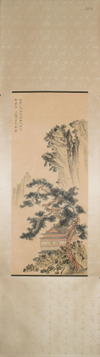 A Chinese scroll of pines in a mountain landscape