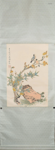 A Chinese scroll depicting birds and flower branches