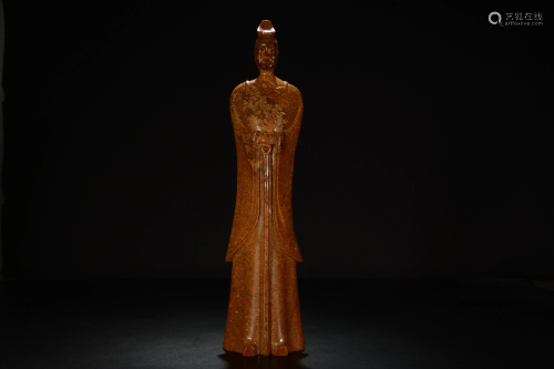 A Chinese russet jade carving of a figure