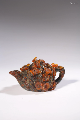A Chinese single-piece amber teapot
