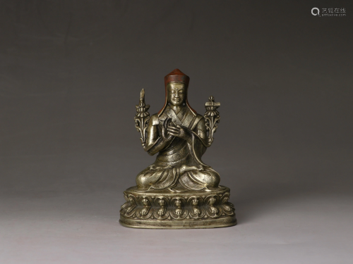 A Sino-Tibetan silver figure of Tsongkhapa