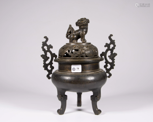 A Chinese bronze censer and cover