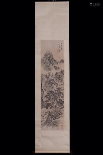 A Chinese scroll of a mountainous river landscape