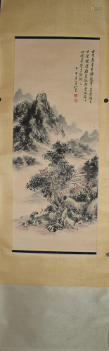 A Chinese scroll depicting a mountainous scenery