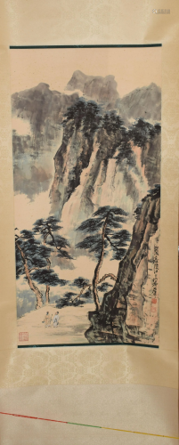 A Chinese scroll depicting scholars under pines