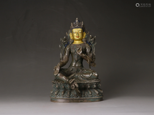 A Sino-Tibetan silver figure of Green Tara