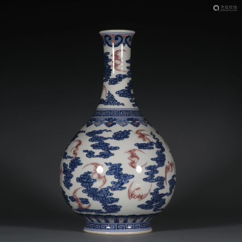 A blue and white cloud-head blessed vase in the