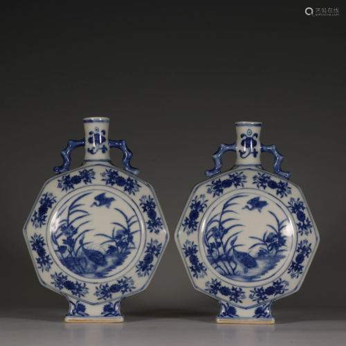 A pair of blue and white moon vases