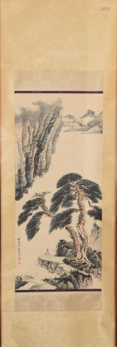 A Chinese scroll of pines in a mountain landscape