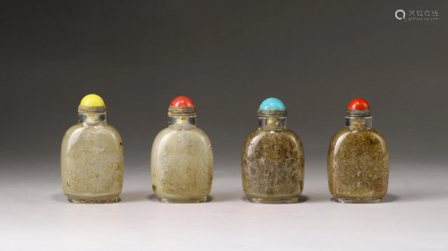 A set of four Chinese crystal snuff bottles
