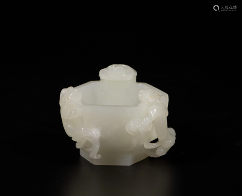 A Chinese carved white jade brush wash