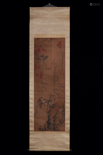 A Chinese scroll depicting flowers and birds
