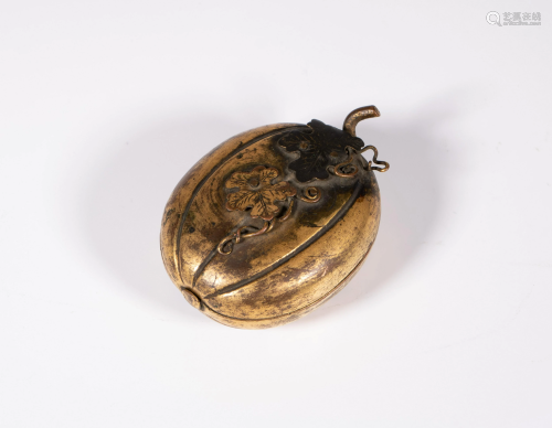 A Chinese gilt bronze melon powder box