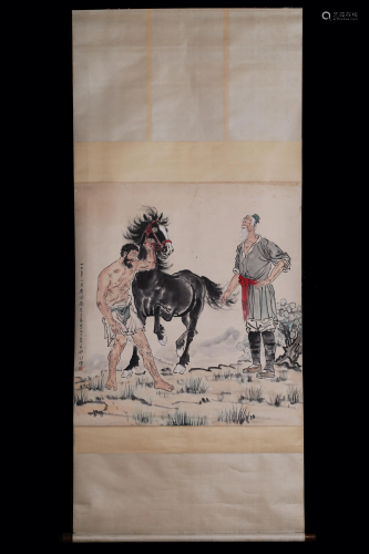 A Chinese scroll depicting figures and a horse