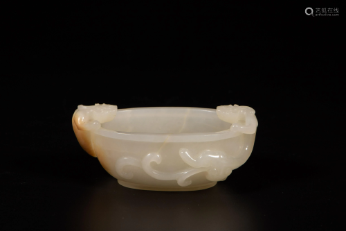 A Chinese carved white jade brush wash