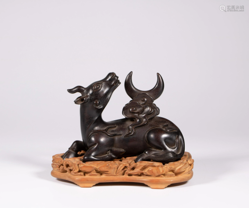 A Chinese zitan wood carving of a veal