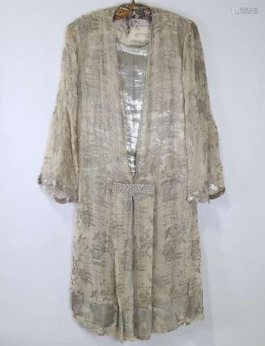 A silk evening dress, circa 1920, with silver thread floral ...