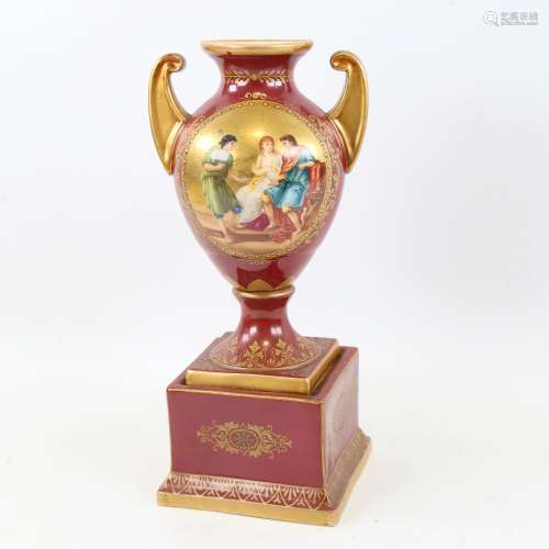 A Vienna porcelain red ground urn, with Classical scene and ...
