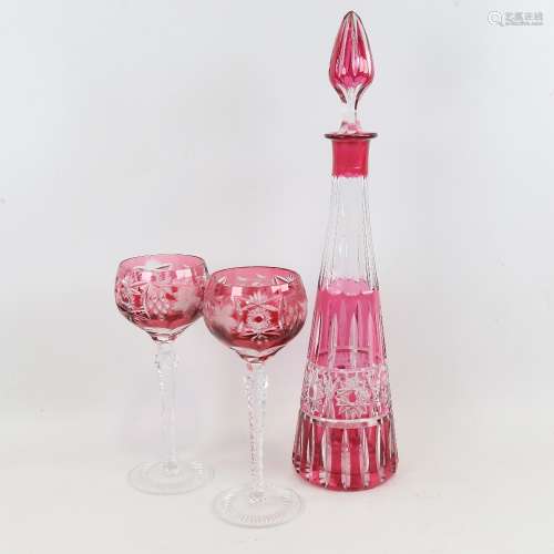 A French cranberry overlay cut-glass decanter, height 42cm, ...