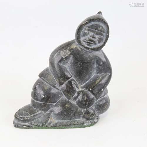 Inuit carved stone figure, etched signature, height 12cm Lig...