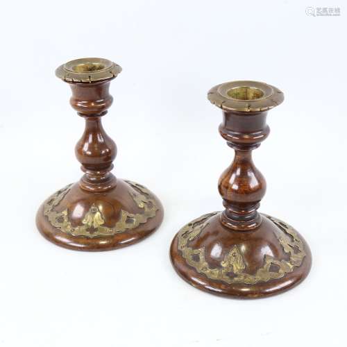 A pair of Victorian brass-mounted walnut candlesticks, heigh...