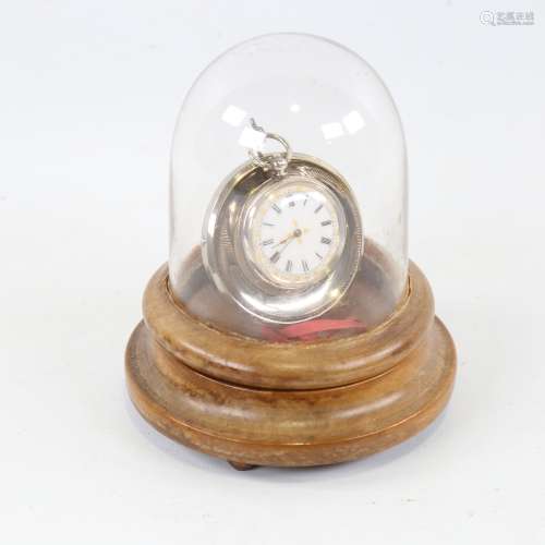 A Victorian walnut pocket watch stand with domed cover, cont...