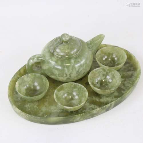 A Chinese green stone tea set on matching tray, tray length ...
