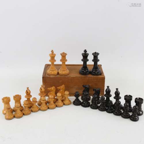 A boxwood and ebonised Staunton pattern chess set, King heig...
