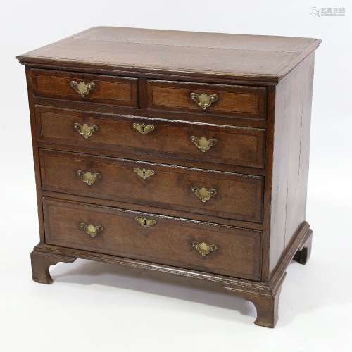 A Georgian oak and mahogany crossbanded chest of 3 long and ...