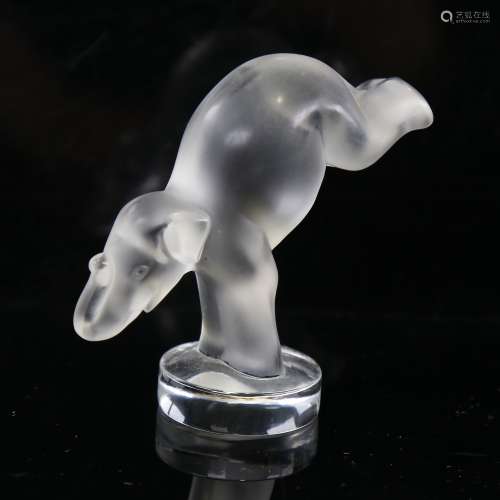 A Lalique opalescent glass performing elephant, engraved sig...