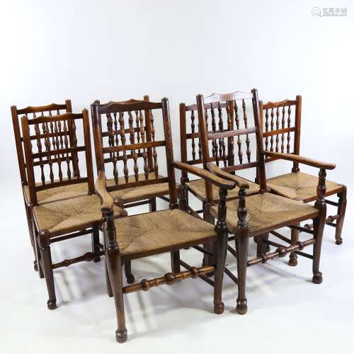 A set of 7 rush-seated elm country dining chairs (5 + 2), wi...