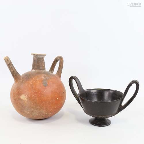 An Ancient terracotta globular redware flagon, height 18cm, ...