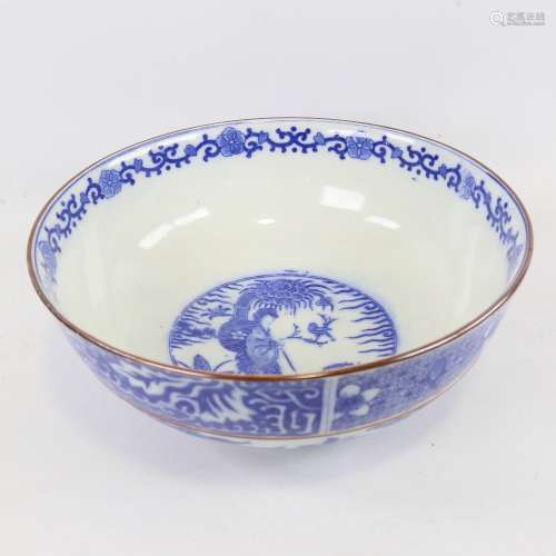 A Chinese blue and white transfer decorated wash bowl, diame...