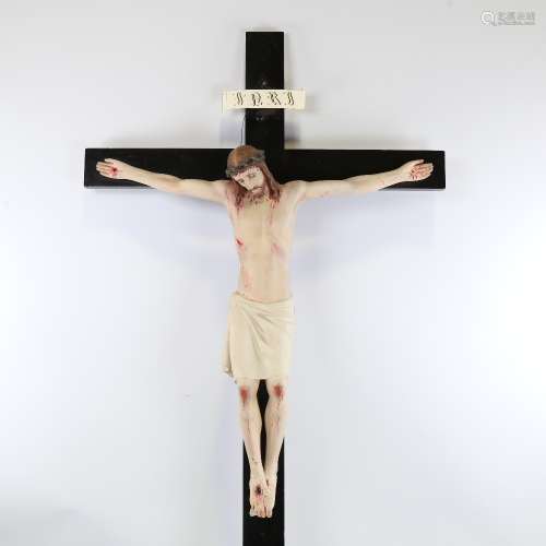 A 19th century carved and painted wood crucifix, overall hei...