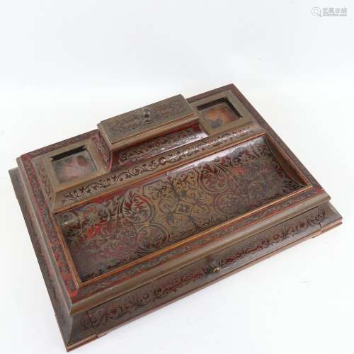 A 19th century French Boulle marquetry desk stand, with hing...