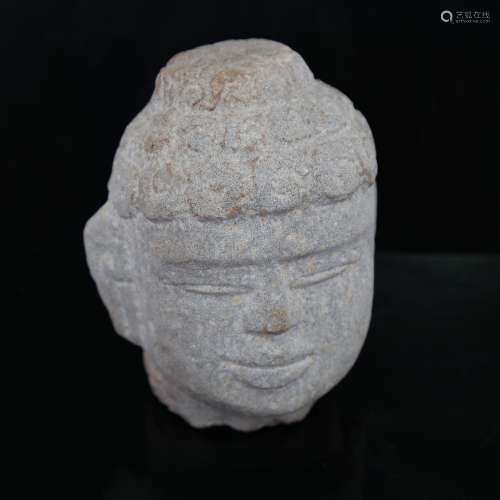 A Chinese carved stone Buddha head, height 11cm Good conditi...