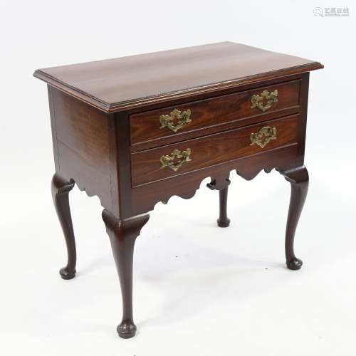 An 18th century mahogany lowboy, 2 frieze drawers with shape...