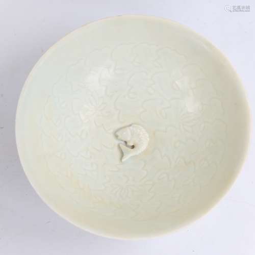 A Chinese celadon glaze porcelain bowl with relief fish cent...