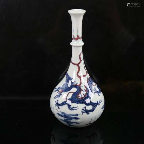 A small Chinese white glaze porcelain bottle vase, hand pain...