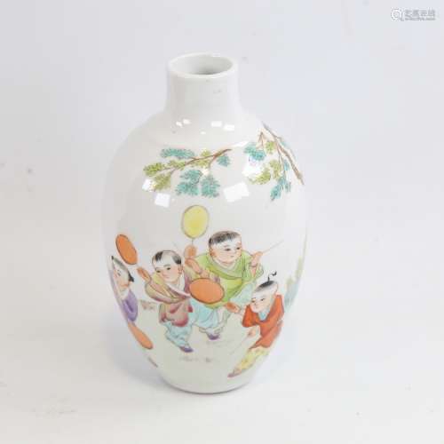 A Chinese porcelain vase with painted study of children play...