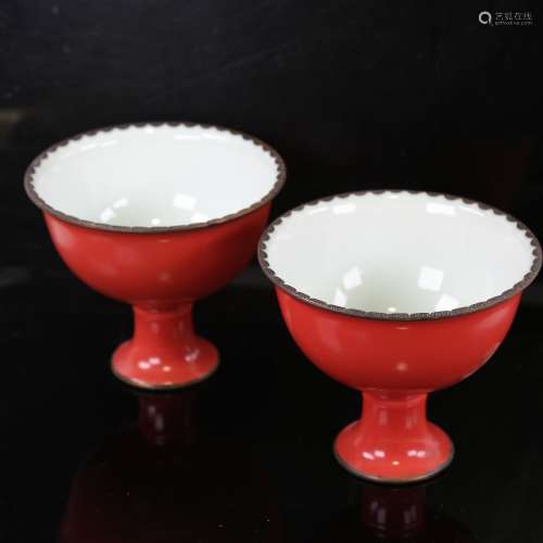 A pair of Chinese coral glaze porcelain stemmed bowls, with ...