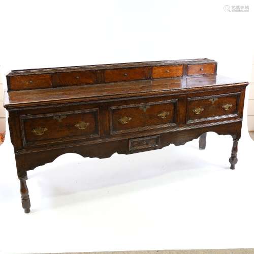An 18th century oak 3-drawer dresser base, with 5-drawer fit...