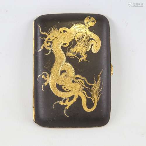 A Japanese Komai cigarette case with gold inlaid dragon deco...