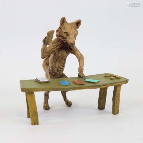 A cold painted bronze fox croupier at a gaming table, length...