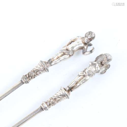 2 19th century plated meat skewers with cherub finials Both ...