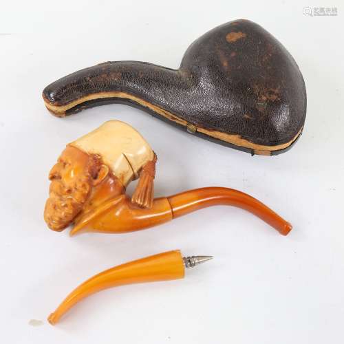 A 19th century carved Meerschaum pipe in the form of an Arab...