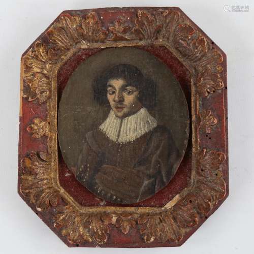 An Antique miniature oil on panel, portrait of a gentleman w...